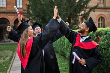 Students in graduation gowns